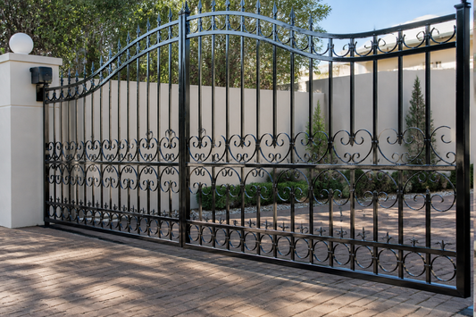 Freshly painted glossy black wrought-iron gate on a South African home