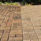 Before and after comparison of brick driveway with Rhinoluxe Stone Sealer showing colour enhancement