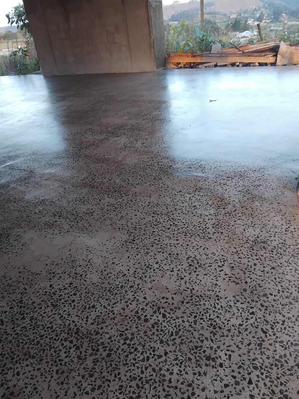 Polished concrete floor with speckled pattern, new house floor