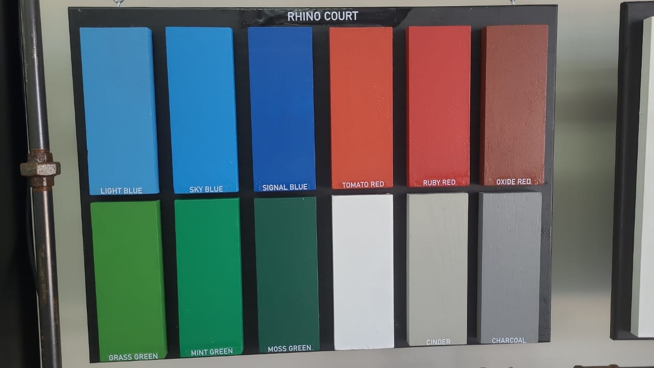Color swatch chart labeled 'Rhino Court' with various color samples for tennis court paint.